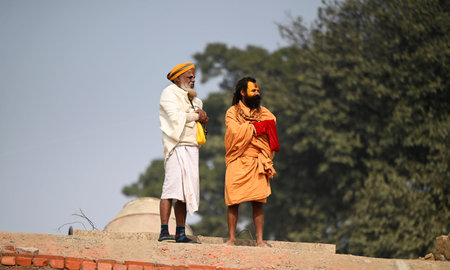 AYODHYA, INDIA â€“ JANUARY 21: A two Sadhu's can standing near the Shri Ram Janmbhomi on the...