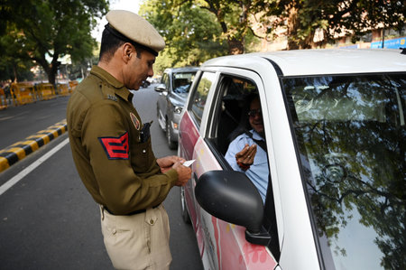 NEW DELHI, INDIA â€“ DECEMBER 15: Security personnel check the vehicles at the entry point of...