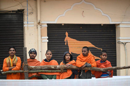 AYODHYA, INDIA - DECEMBER 30: A group of young priest are waiting for Prime minister Narendra Modi's...