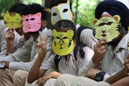 NEW DELHI, INDIA â AUGUST 26: School students celebrating the first birthday of twin cubs \"AVNI\" and \"VYOM\" of tigress \"SITA\" as they turned one year old at National Zoological Park , on August 26, 2023 in New Delhi, India. (Photo by Raj K Raj/Hinのeditorial素材