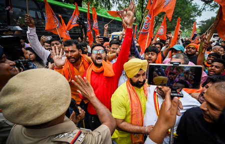 NEW DELHI, INDIA â€“ MAY 1: Members of the Vishwa Hindu Parishad and Bajrang Dal shouted...