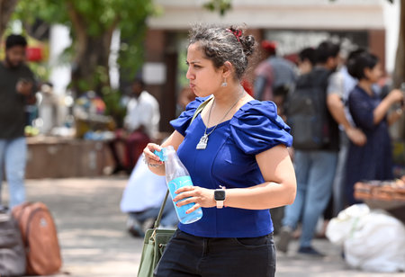 NEW DELHI, INDIA â MAY 21: People out at Connaught Place on hot afternoon, on May 21, 2023 in New Delhi, India. (Photo by Sanjeev Verma/Hindustan Times )のeditorial素材
