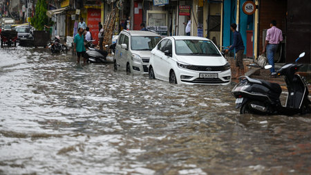 NEW DELHI, INDIA - JULY 8: Commuters moves through a water logged street after heavy rains lashes out the city at Ganesh Nagar on July 8, 2023 in New Delhi, India. Delhi-NCR was drenched with heavy rain on the intervening night of Friday and Saturday. Theのeditorial素材