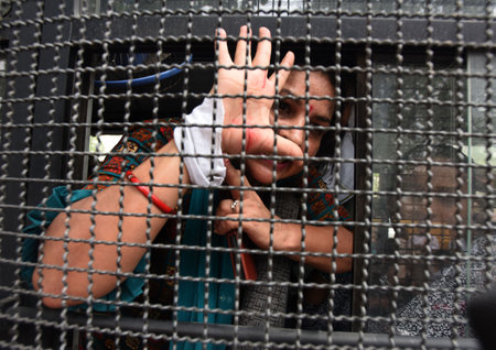 NEW DELHI, INDIA - JULY 3: Police personal details Indian Youth Congress activists protesting  demanding the resignation of the Chief Minister of Manipur at Near Shastri Bhavan on July 3, 2023 in New Delhi, India. Congress demanded the resignation of Chieのeditorial素材