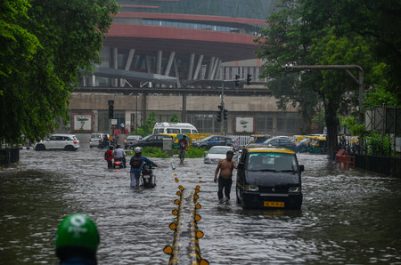 NEW DELHI, INDIA - JULY 8: Traffic moves through a water logged street after the Heavy rains at Supreme Court of India on July 8, 2023 in New Delhi, India. Delhi-NCR was drenched with heavy rain on the intervening night of Friday and Saturday. The overnigのeditorial素材