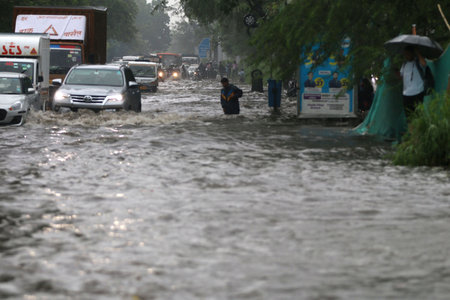 NEW DELHI, INDIA - JULY 8: After heavy monsoon rainfall waterlogged at Mathura road connecting Nehru place flyover, on July 8, 2023 in New Delhi, India. Delhi-NCR was drenched with heavy rain on the intervening night of Friday and Saturday. The overnight のeditorial素材