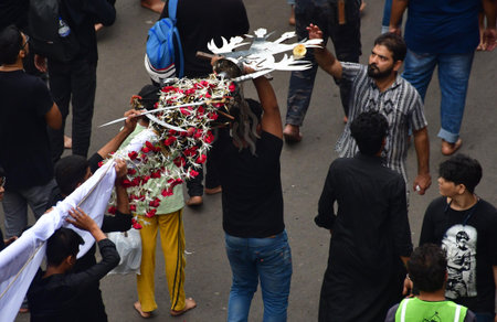 MUMBAI, INDIA - JULY 29: Shia Muslims participate in a Muharram procession near JJ Hospital, on July...