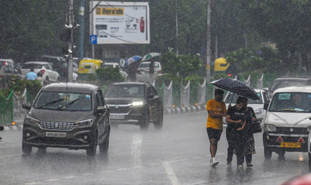 NEW DELHI, INDIA - JULY 10: Commuters seen during heavy rain at ITO Bahadur shah zafar on July 10, 2023 in New Delhi, India. Several parts of northwest India witnessed a heavy spell of rain breaking a 40-year-old record. It recorded 153 mm of rain in 24 hのeditorial素材