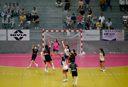NOIDA, INDIA â JULY 22: The 10th Asian Women's Youth (U18) Handball Championship match is currently underway at Noida Stadium, featuring an intense face-off between South Korea and Chinese Taipei, on July 22, 2023 in Noida, India. This thrilling match sのeditorial素材