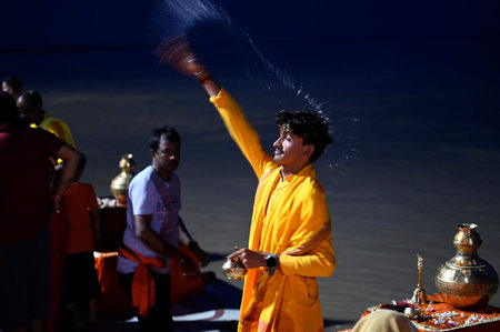 LUCKNOW, INDIA - JULY 9: Priests performing evening Sarayu Aarti at Ayodhya, on July 9, 2023 in...