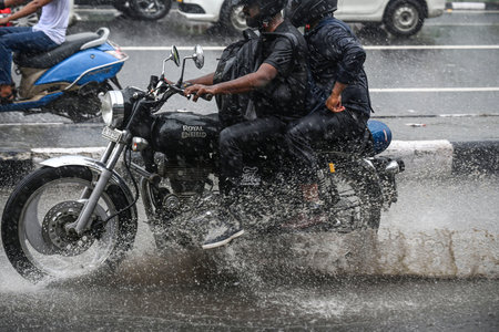 NEW DELHI, INDIA - JULY 10: Commuters moves through a water logged street after heavy rains lashes out the city at ITO Bahadur shah zafar on July 10, 2023 in New Delhi, India. Several parts of northwest India witnessed a heavy spell of rain breaking a 40-のeditorial素材