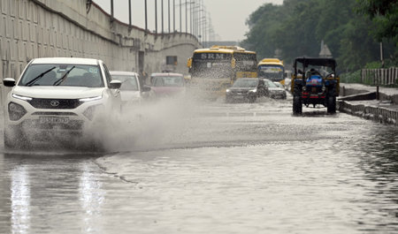NEW DELHI, INDIA - JULY 26: Vehicles wade through a Waterlogged stretch near Mayur Vihar Phase-2 during monsoon rain, on July 26, 2023 in New Delhi, India. The residents of Delhi-NCR witnessed heavy rainfall. Commuters faced problems due to waterlogging iのeditorial素材