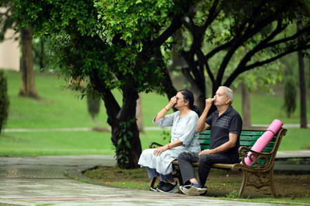 LUCKNOW INDIA JUNE 21 2023 An old couple performing Yoga on the occasion of International Yoga Day at Dr Ram Manohar Lohiya Park on June 21 2023 in Lucknow India Photo by Deepak Gupta Hindustan Timesのeditorial素材