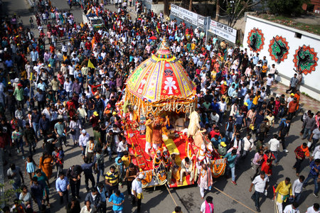 NEW DELHI INDIA JUNE 20 2023 Devotees take part in the annual Jagannath Rath Yatra the festival of chariots at Hauz Khas on June 20 2023 in New Delhi India The Jagannath Puri Rath Yatra is an annual festival celebrated in the city of Puri Odisha The festiのeditorial素材