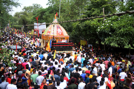 NEW DELHI INDIA JUNE 20 2023 Devotees take part in the annual Jagannath Rath Yatra the festival of...