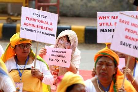 NEW DELHI INDIA JUNE 19 2023 Group of women from Manipur Emas sit in protest against the ongoing violence in Manipur to demand the support from Prime Minister Of India at Jantar Mantar on June 19 2023 in New Delhi India Photo by Salman Ali Hindustan Timesのeditorial素材