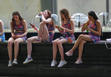 NEW DELHI INDIA JUNE 17 2023 Visitors take a break near Fountain on a rainy day at Pragati Maidan on June 17 2023 in New Delhi India The India Meteorological Department had predicted light rain with gusty winds in Delhi NCR on Thursday According to the weのeditorial素材