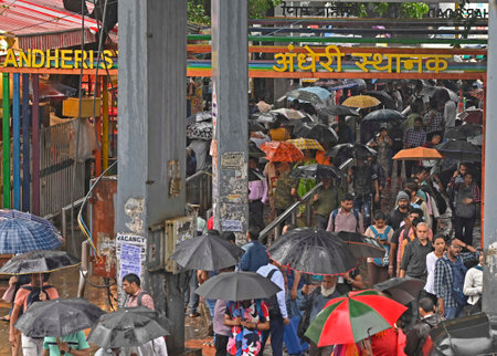 MUMBAI INDIA JULY 19 2023 People seen walking holding umbrellas as the maximum city received heavy...
