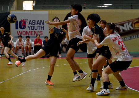 NOIDA INDIA JULY 22 2023 The 10th Asian Womens Youth U18Handball Championship match is currently underway at Noida Stadium featuring an intense face off between China and Japan on July 22 2023 in Noida India This thrilling match serves as the semi final oのeditorial素材