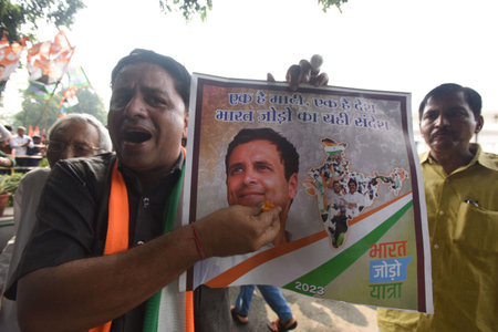 NEW DELHI, INDIA - AUGUST 4:  Congress supporters celebrate after the Supreme Court stayed the conviction of their party leader Rahul Gandhi in the defamation case over his Modi surname remark on August 4, 2023 in New Delhi, India.  (Photo by Sonu Mehta/Hのeditorial素材