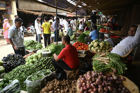 GURUGRAM, INDIA - AUGUST 9: People buy vegetables and medicines in the main market of Nuh during the three-hour relaxation in curfew imposed by district administration in Nuh police station after the communal violence on August 9, 2023 near Gurugram, Indiのeditorial素材