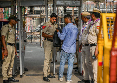 NEW DELHI, INDIA â AUGUST 12: People are frisked by Delhi Police and paramilitary Security personnel at an entry point near Red Fort ahead of the Independence Day celebration, on August 12, 2023 in New Delhi, India. (Photo by Raj K Raj/Hindustan Times)のeditorial素材
