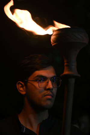 NOIDA, INDIA â AUGUST 13: People of Hussaini community participated in the silent candle march in memory of the martyrs of Karbala at Sector 21 Road on Saturday evening, on August 13, 2023 in Noida, India. (Photo by Sunil Ghosh/Hindustan Times)のeditorial素材