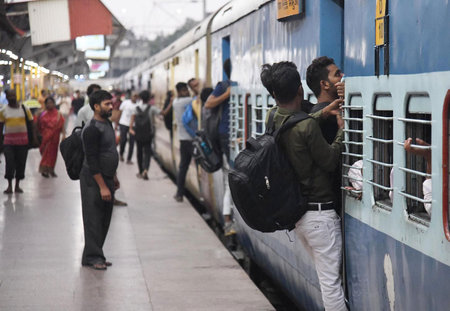 PATNA, INDIA â€“ AUGUST 26: Aspirants gather to board a train after the last day of Teacher...