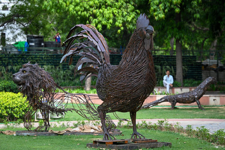 NEW DELHI INDIA JUNE 4 2023 Birds and animals made from scrap metal seen placed inside a park ahead of the preparations for G20 Summit at Chanakyapuri on June 4 2023 in New Delhi India To be developed on the theme of âOne Earth One Family One Futureâ のeditorial素材