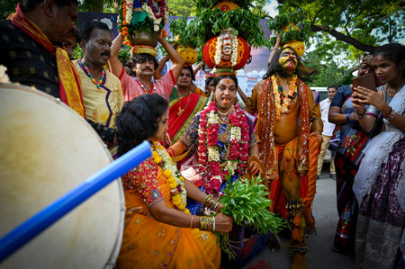 NEW DELHI INDIA JUNE 20 2023 People of Telangana celebrating and dancing during the Lal Darwaza Bonalu celebrations at Telangana Bhawan on June 20 2023 in New Delhi India Bonalu is celebrated usually during Ashada Masam which falls in July August Special のeditorial素材
