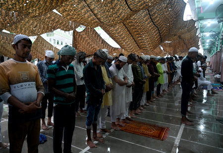 NOIDA INDIA JUNE 29 2023 Muslims offer prayers namaz on the occasion of Eid AL Adha at the Sector 8 Jama Masjid on rainy day on June 29 2023 in Noida India Eid ul Adha also known as Bakra Eid Bakrid Eid al Adha Eid Qurban or Qurban Bayarami is Islamic fesのeditorial素材