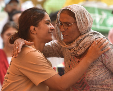 NEW DELHI INDIA MAY 14 2023 Wrestler Vinesh Phogat with supporters during the protest against Wrestling Federation of India WFI president Brij Bhushan Sharan Singh at Jantar Mantar on May 14 2023 in New Delhi India Photo by Sonu Mehta Hindustan Timesのeditorial素材