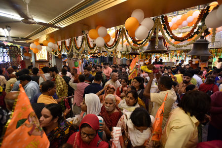 NEW DELHI INDIA APRIL 6 2023 Devotees gathered offering Prayers at Oldest Hanuman Temple to...