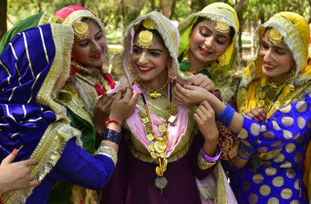 AMRITSAR INDIA APRIL 8 2023 Students perform a traditional Punjabi folk dance Giddha during...