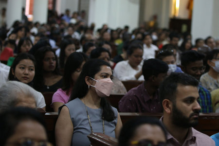 NEW DELHI INDIA APRIL 9 2023 People at Sacred Heart Cathedral Church to offer prayer on the occasion of Easter on April 9 2023 in New Delhi India Easter is celebrated to mark the resurrection of Jesus Christ after his crucifixion on Good Friday Easter Sunのeditorial素材