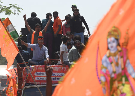 NOIDA INDIA APRIL 9 2023 Devotees from different Hindu organizations take out a procession after...