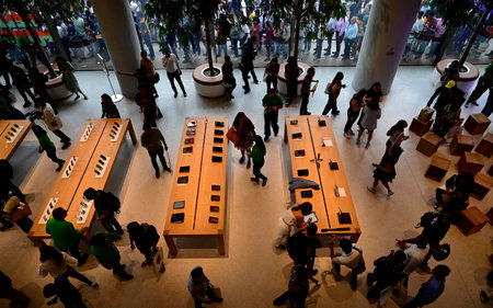 MUMBAI INDIA APRIL 18 2023 Visitors try various Apple device displayed during inauguration of Apple Store first outlet opened in India at Bandra Kurla Complex on April 18 2023 in Mumbai India Photo by Anshuman Poyrekar Hindustan Timesのeditorial素材
