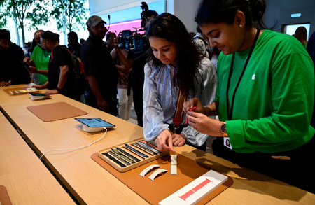 MUMBAI INDIA APRIL 18 2023 Visitors try various Apple device displayed during inauguration of Apple Store first outlet opened in India at Bandra Kurla Complex on April 18 2023 in Mumbai India Photo by Anshuman Poyrekar Hindustan Timesのeditorial素材