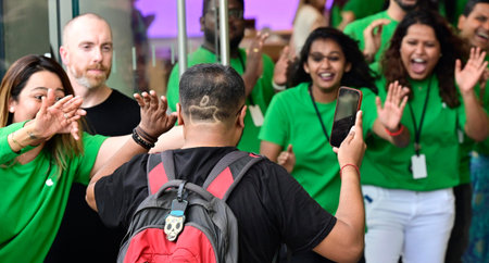 MUMBAI INDIA APRIL 18 2023 Staff greet visitors during inauguration of Apple Store first outlet...