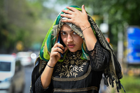NEW DELHI INDIA APRIL 19 2023 Students out during a hot summer day at Chanakyapuri on April 19 2023 in New Delhi India Photo by Sanchit Khanna Hindustan Timesのeditorial素材