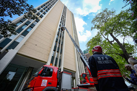 NEW DELHI INDIA APRIL 20 2023 Firefighters shows their skills during a fire mock drill at HT House...