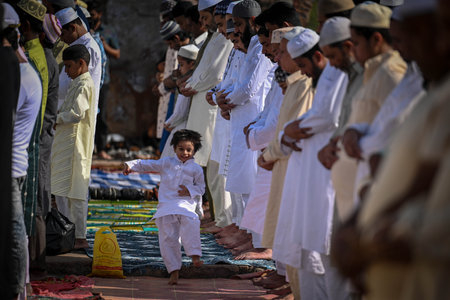 NEW DELHI INDIA APRIL 22 2023 Muslims offer Eid al Fitr prayers at the 14th century Feroz Shah Kotla Jami Mosque marking the end of the holy fasting month of Ramadan on April 22 2023 in New Delhi India Muslims around the world are getting into the festiveのeditorial素材