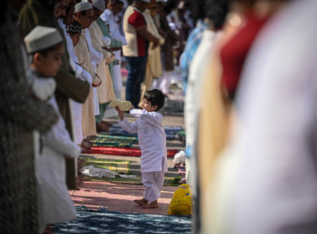 NEW DELHI INDIA APRIL 22 2023 Muslims offer Eid al Fitr prayers at the 14th century Feroz Shah Kotla Jami Mosque marking the end of the holy fasting month of Ramadan on April 22 2023 in New Delhi India Muslims around the world are getting into the festiveのeditorial素材