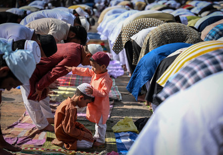 NEW DELHI INDIA APRIL 22 2023 Muslims offer Eid al Fitr prayers at the 14th century Feroz Shah Kotla Jami Mosque marking the end of the holy fasting month of Ramadan on April 22 2023 in New Delhi India Muslims around the world are getting into the festiveのeditorial素材