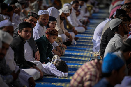 NEW DELHI INDIA APRIL 22 2023 Muslims offer Eid al Fitr prayers at the 14th century Feroz Shah Kotla Jami Mosque marking the end of the holy fasting month of Ramadan on April 22 2023 in New Delhi India Muslims around the world are getting into the festiveのeditorial素材