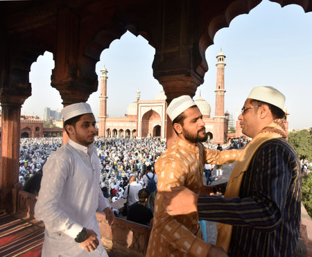 NEW DELHI INDIA APRIL 22 2023 Muslims greets after offer prayers at the Jama Masjid on the occasion of Eid ul Fitr in Old Delhi on April 22 2023 in New Delhi India Muslims around the world are getting into the festive Eid spirit as the holy month of Ramadのeditorial素材