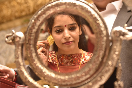 NEW DELHI INDIA APRIL 22 2023 People shop for gold on the occasion of Akshaya Tritiya at PP jewelers Karol Bagh on April 22 2023 in New Delhi India Akshaya Tritiya also known as Akti or Akha Teej is a popular Hindu and Jain spring festival that occurs annのeditorial素材