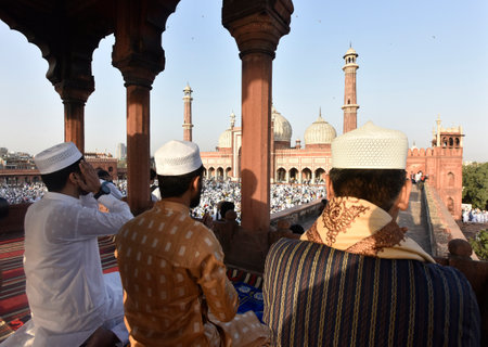 NEW DELHI INDIA APRIL 22 2023 Muslims greets after offer prayers at the Jama Masjid on the occasion of Eid ul Fitr in Old Delhi on April 22 2023 in New Delhi India Muslims around the world are getting into the festive Eid spirit as the holy month of Ramadのeditorial素材
