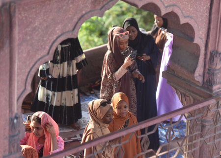 NEW DELHI INDIA APRIL 22 2023 Muslims greets after offer prayers at the Jama Masjid on the occasion of Eid ul Fitr in Old Delhi on April 22 2023 in New Delhi India Muslims around the world are getting into the festive Eid spirit as the holy month of Ramadのeditorial素材