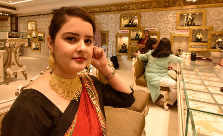 NEW DELHI INDIA APRIL 22 2023 People shop for gold on the occasion of Akshaya Tritiya at PP jewelers...